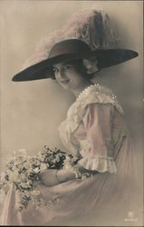 Colorized photo of woman large feather hat, bouquet Postcard