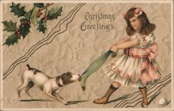 Christmas Greetings - Girl playing with dog. Embossed Postcard