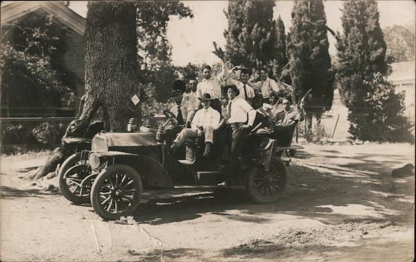 Road inspection tour - over full car of male supervisors. California