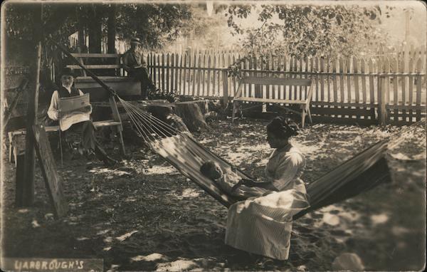 A Woman Sitting with a Child in a Hammock Guerneville California