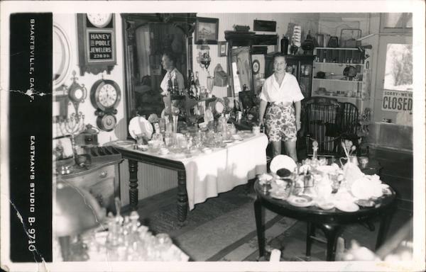 Antique shop, Haney Poole Jewelers wall clock, glassware, mirror, furniture Smartsville California