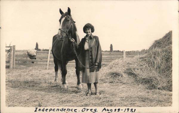 Horse on lead held by woman Aug 23-1921 Independence Oregon