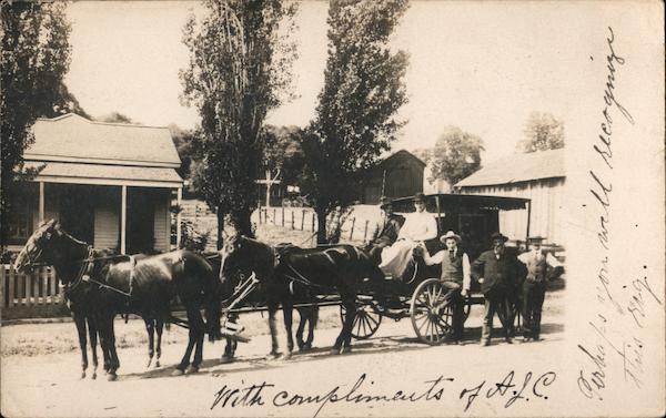 Five men with horse drawn covered carriage posing for picture