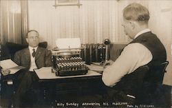 Billy Sunday answering his mail, typewriter on desk Postcard Postcard Postcard