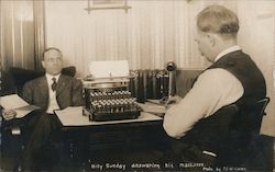 Billy Sunday answering his mail, typewriter on desk Postcard