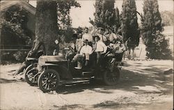Road inspection tour - over full car of male supervisors. Postcard