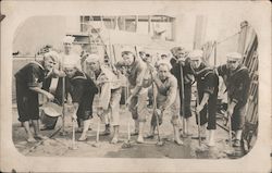Holy stoning the deck by sailors Postcard