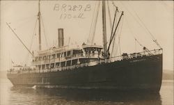 An unidentified steamship near shore Postcard