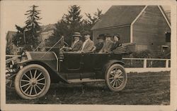 Woman driving car with people in car Postcard