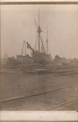 Ships in dry dock in ship yard for repairs Postcard