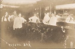 Russell Bar: bartenders and customers in a bar Postcard