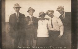 A rose between thorns (woman posing with four men) Postcard