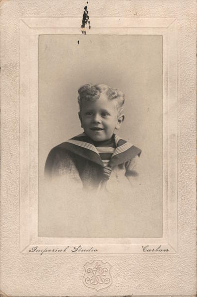 Imperial Studio photo of little boy in sailor suit, curls, missing front teeth San Francisco California