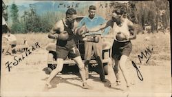 Two men boxing, man refereeing by car Original Photograph