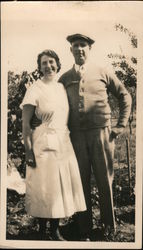 Photo of smiling couple in garden. 1934 Original Photograph