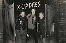 X-Capees. A San Francisco Punk Photo Documentary. Invitation to photo exhibit and book signing. Postcard