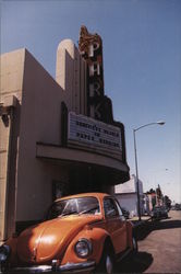 Volkswagen Beetle passing the Park Theater Postcard