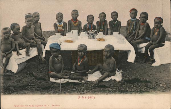 A tea party. African children having a tea party, beads