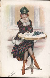 Woman at table with a drink. Postcard