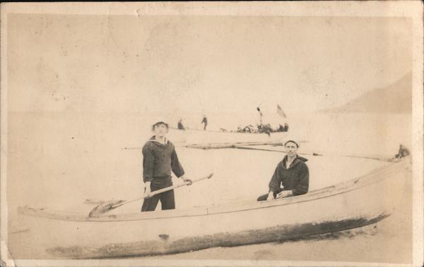 Navy sailors ashore in small boats, 1908
