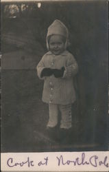 Toddler in windter clothes titled "Cook At North Pole" Postcard