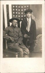 Two young boys in front of American flag Postcard