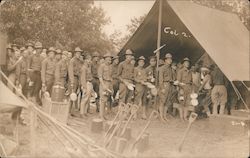 Soldiers lined up in front of tent Postcard