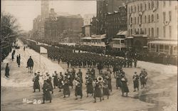 Military parade with marching band in a city in winter Postcard