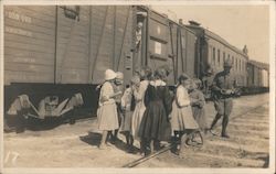 Children in front of railcars Postcard
