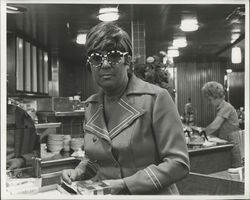 1960's Woman at Diner counter wearing modern black & white sunglasses Original Photograph