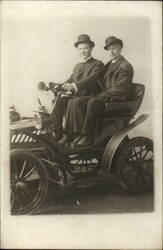 Two Gentlemen in Early Model Automobile Postcard