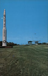 Model of a Minuteman Missile at the main entrance to the Minot Air Force Base North Dakota Postcard Postcard Postcard