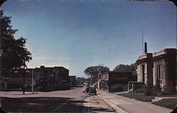 View of East Mitchell Street business section Postcard