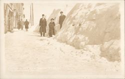 Photo of People Next to High Snow Bank Postcard