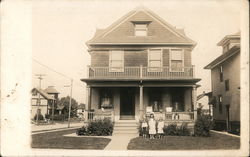 Children in front of House Postcard