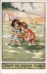 Don't be frightet Teddy, Children take teddy bear bathing at seaside. Postcard