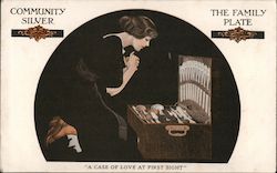 A Case of Love at First Sight, a woman gazes at a silverware collection in a box Postcard