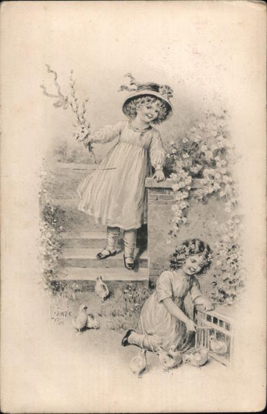 Two little girls playing with chicks Austria