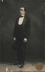 Man in nice evening suit with hat in hand Postcard