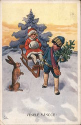 "vesele vanoce!" Merry Christmas! Boy and girl sled with a rabbit Postcard