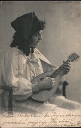 Boy Playing Mandolin Postcard