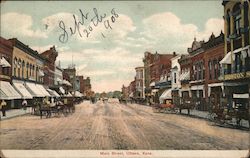 View of Main Street, showing buildings and horse and buggy transportation Postcard