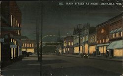 Color view of Main Street at night Postcard