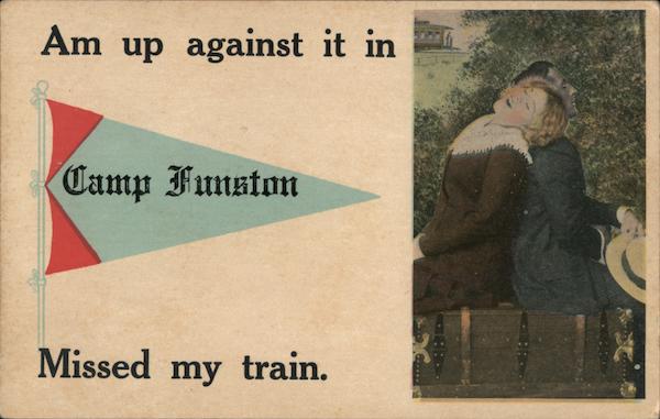 Comic greeting Am up against it in Camp Funston. Missed my train. Couple lean back to back against each other.