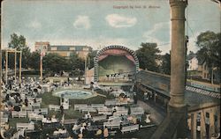 Color view of people attending an event at Celeron Grounds park with a large outdoor stage. Postcard