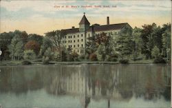 View of St. Mary's Academy, showing the building and surrounding lake Postcard