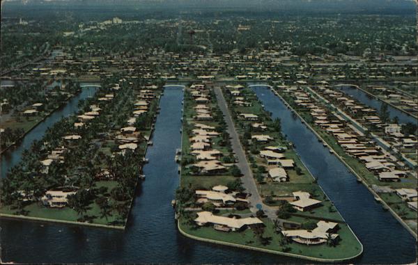 Aerial view of many new homes and surrounding waterways in the Venice of America Fort Lauderdale Florida