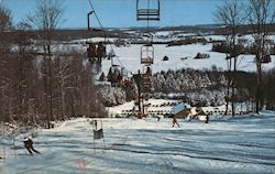 View of the ski lift, ski trail and surrounding area at the Peek 'N Peak Ski Center Postcard
