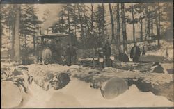 Men Cutting Logs in the Snow Postcard