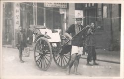 Boy Pulling Rickshaw Postcard